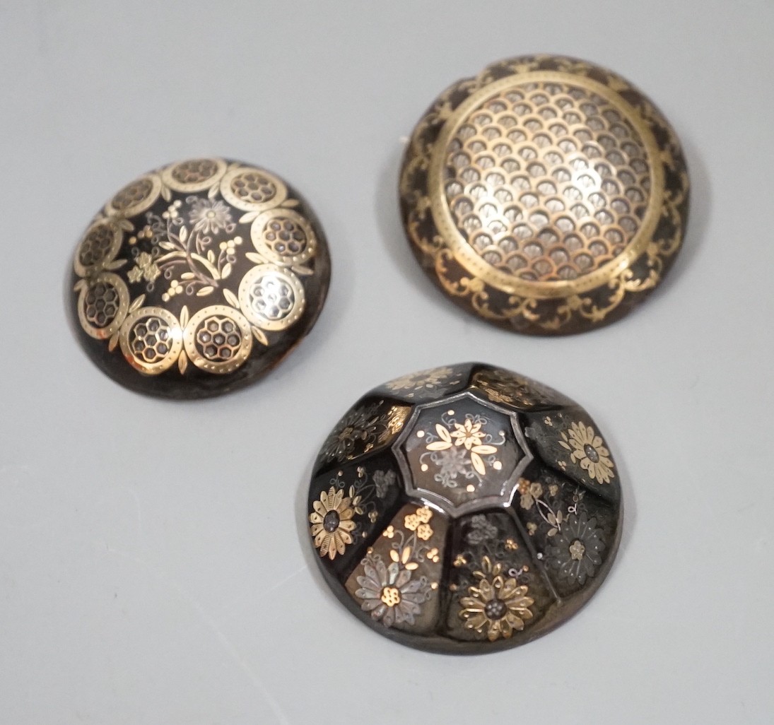 Three 19th century gold and silver pique work tortoiseshell brooches